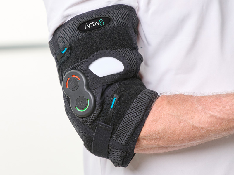 Man wearing the Activ8 Elbow device on his elbow.