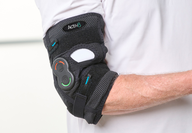 Man wearing the Activ8 Elbow device on his arm.