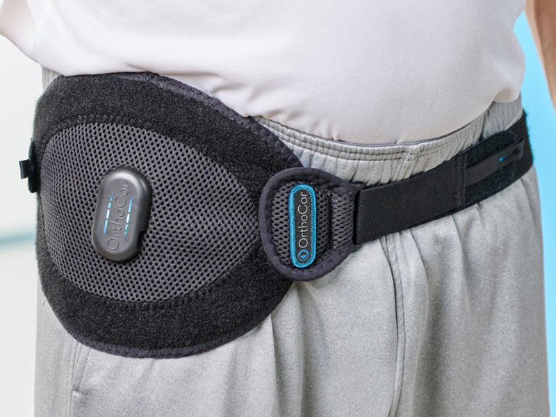 Person wearing the Active Universal device around their waist.