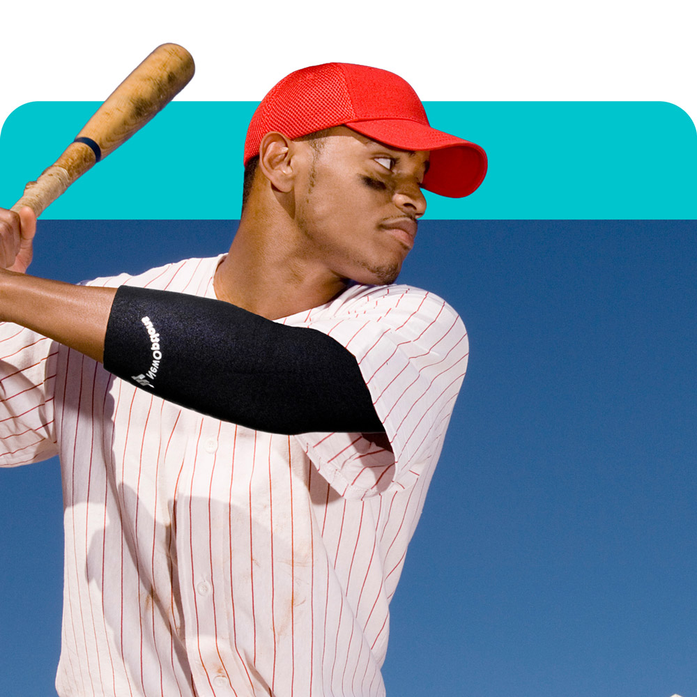 a man playing baseball and wearing an elbow support brace