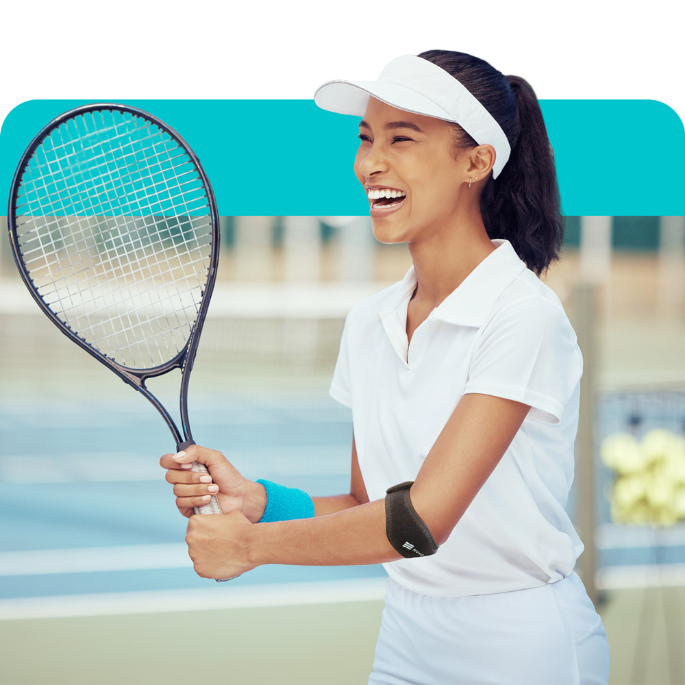 a woman holding a tennis racket and wearing a support brace