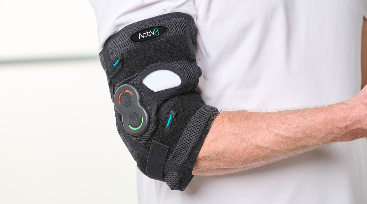 A person wearing an Activ8 System brace to support their elbow