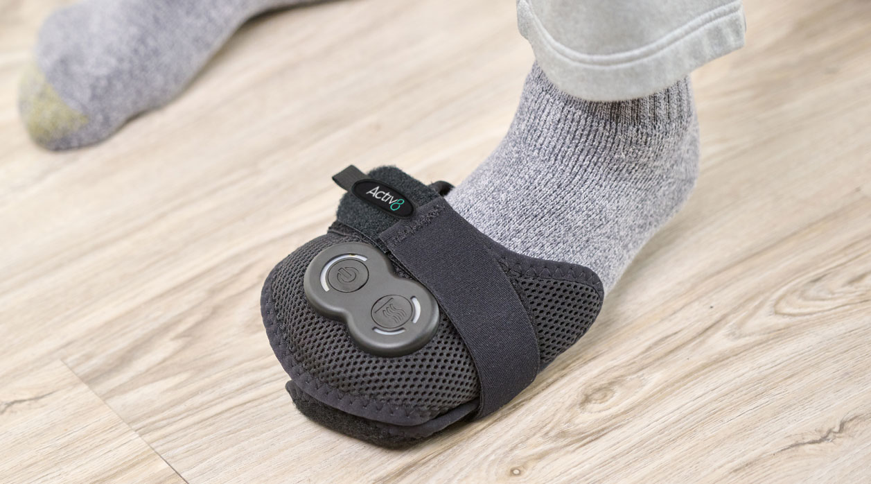 A person wearing an Activ8 System brace to support their foot