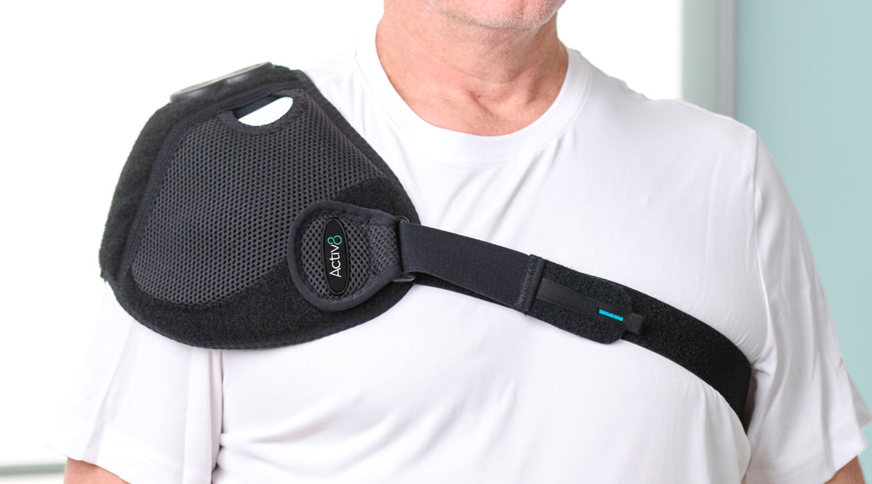 A person wearing an Activ8 System brace to support their shoulder