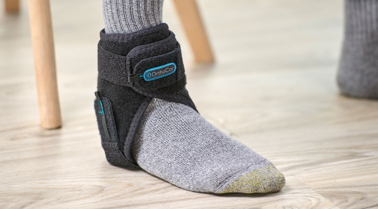 A person wearing an Active Systems brace to support their ankle