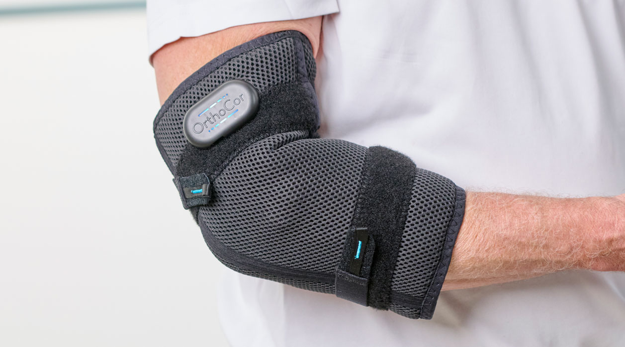 A person wearing an Active Systems brace to support their elbow