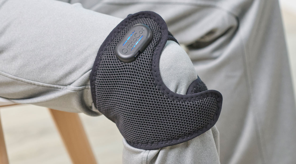 A person wearing an Active Systems brace to support their knee