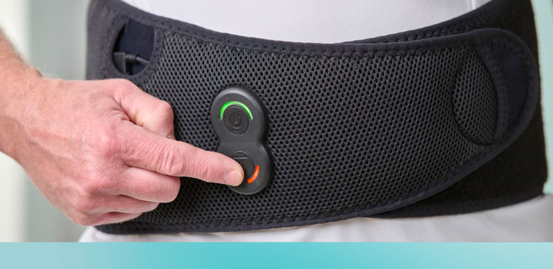 A person wearing an Active System brace on their back
